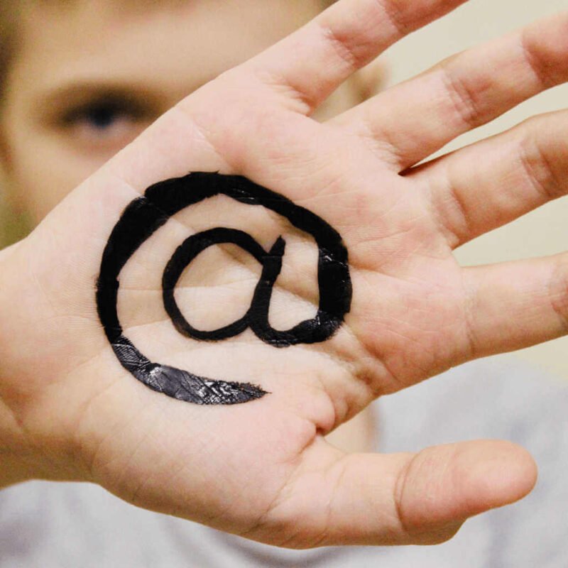 Hand with @ Sign