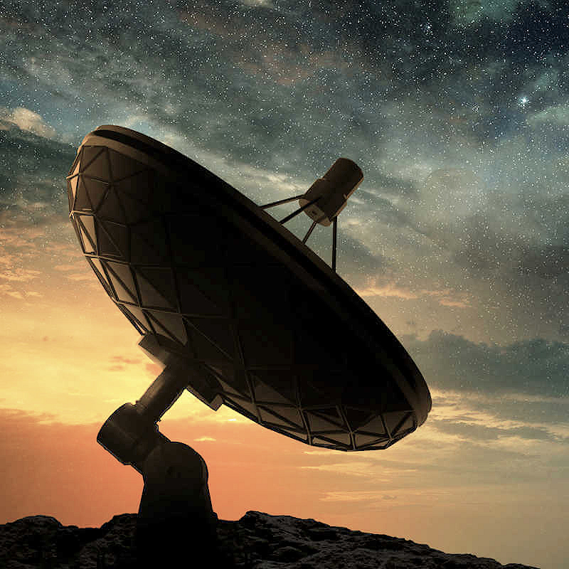 Radio telescope at sunrise with muted colors